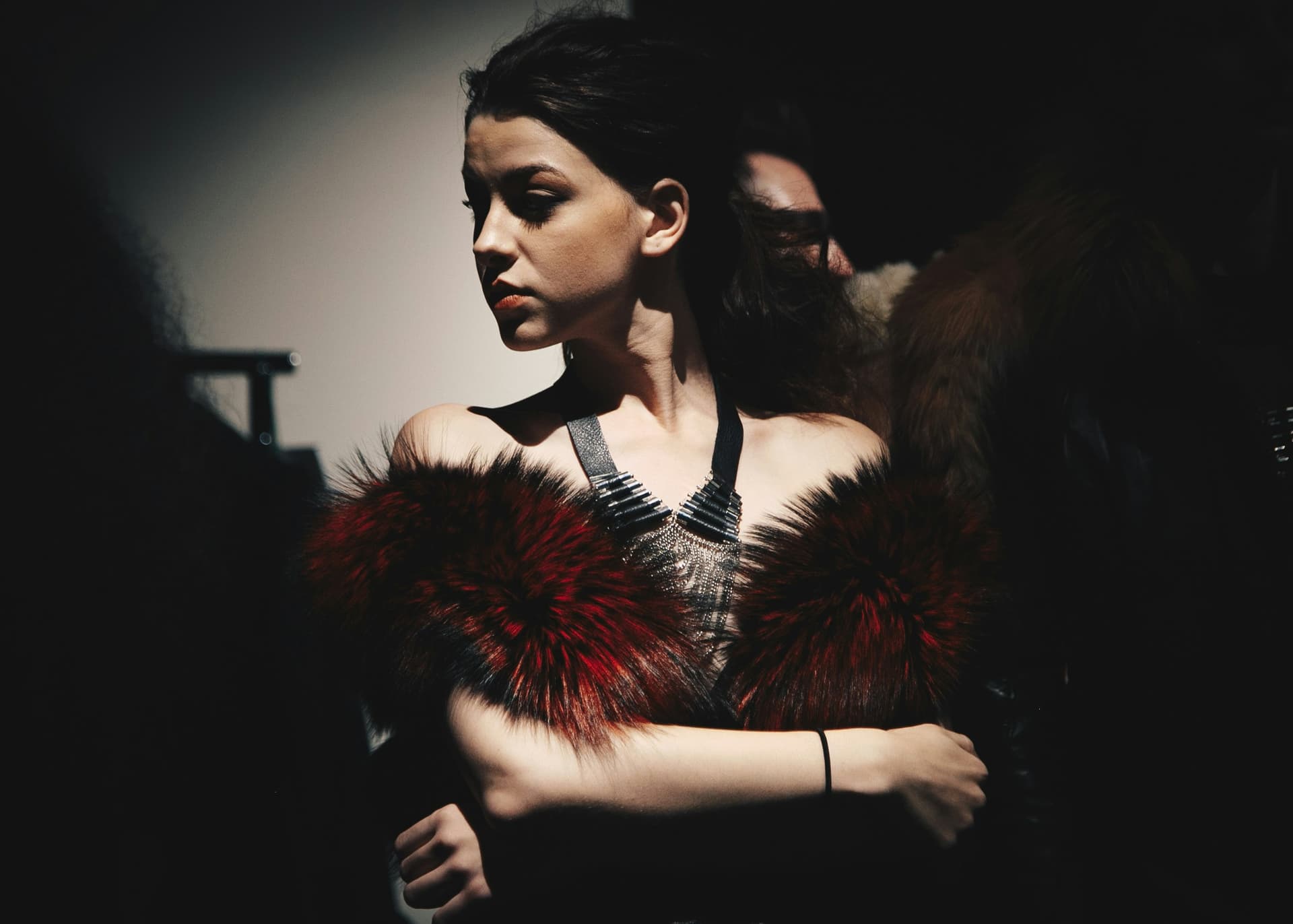 Models wait in a casting or fitting environment
